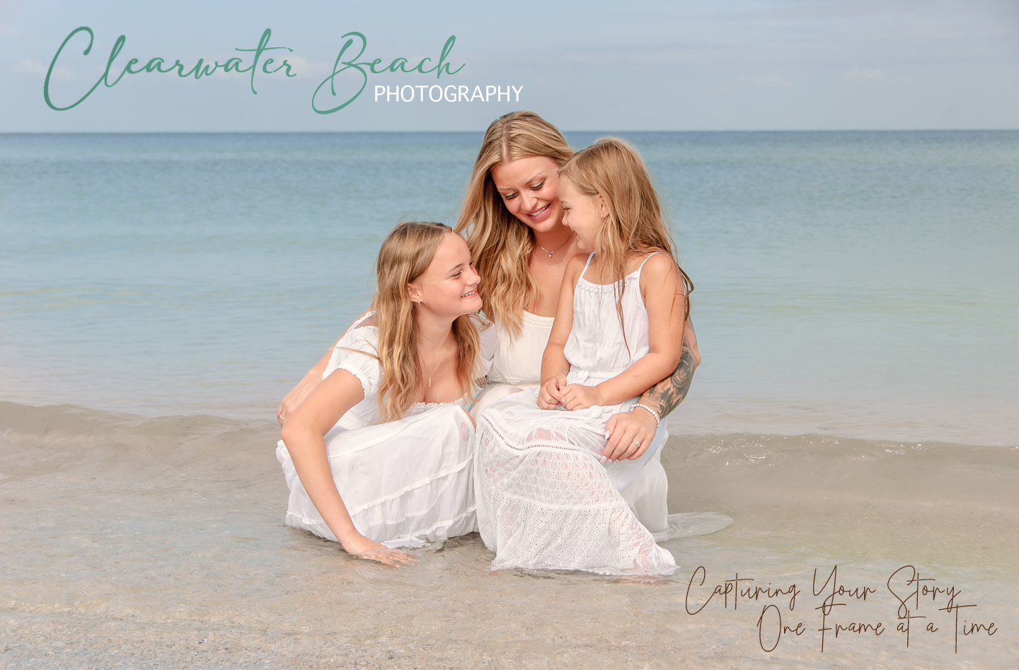 Clearwater Beach Photography photo of mother and two daughters by the water